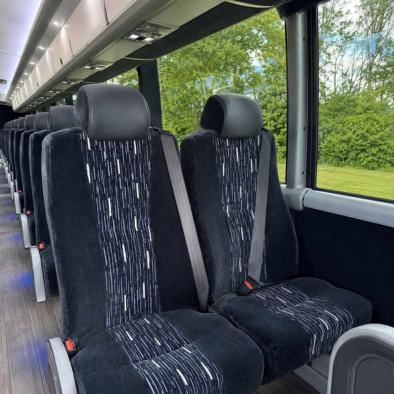 how bus type and size change charter bus prices in sunrise florida